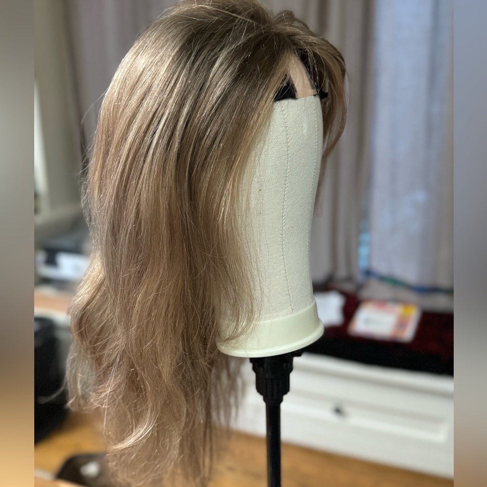 100%  human hair wig by Jessie’s wigs. Ash blonde size standard medium 24”